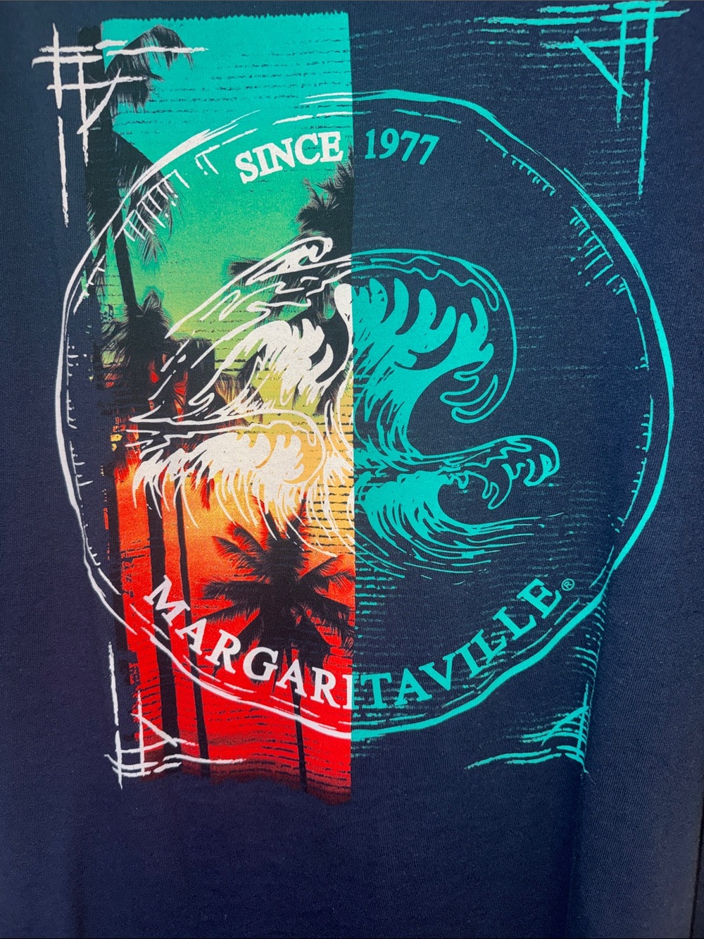 Margaritaville Blue Short Sleeve Tee with Green Wave Emblem